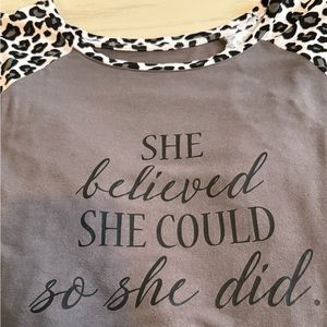 Women’s leopard print 3/4 sleeve shirt. She believes she could so she did.